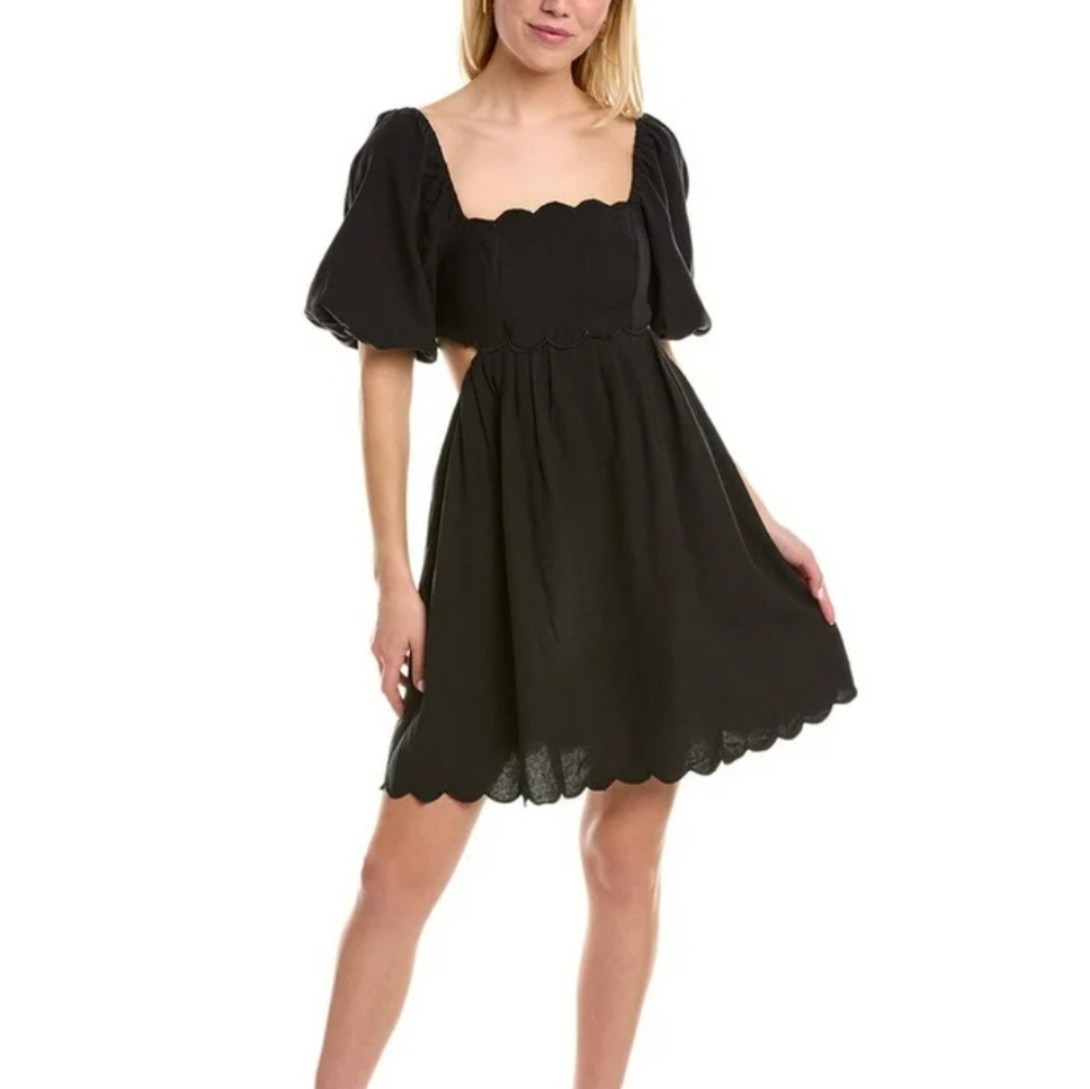 Opt black Rivera mini dress with poof sleeves and scalloped edge. Open back wit